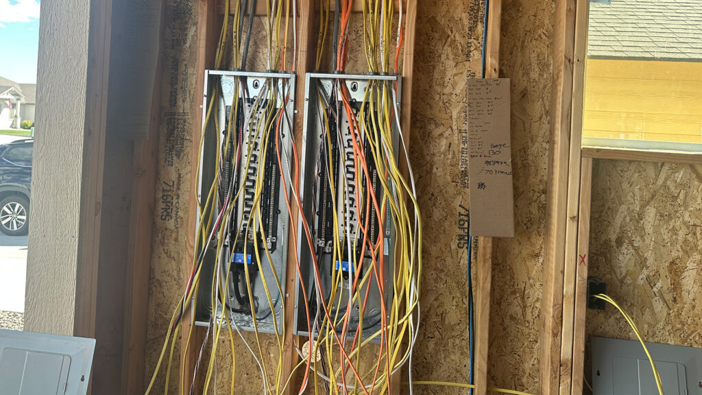Electrical panel rough-in with organized wiring during new construction by Tadeo Electric LLC